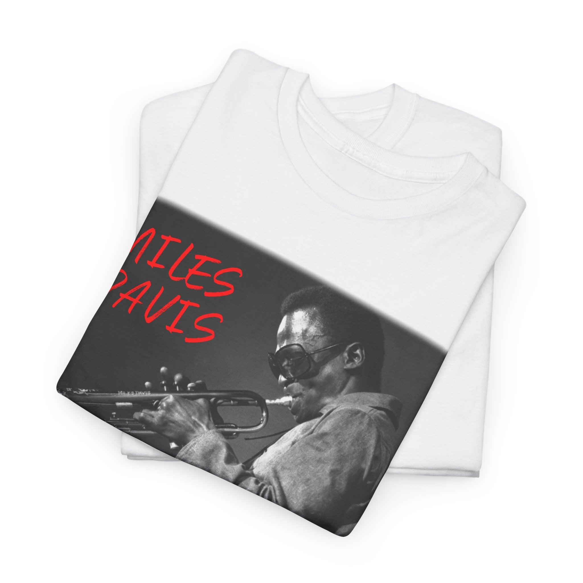 A black & white photographic image of Miles Davis playing trumpet in cool shades, with red text saying ‘Miles Davis’