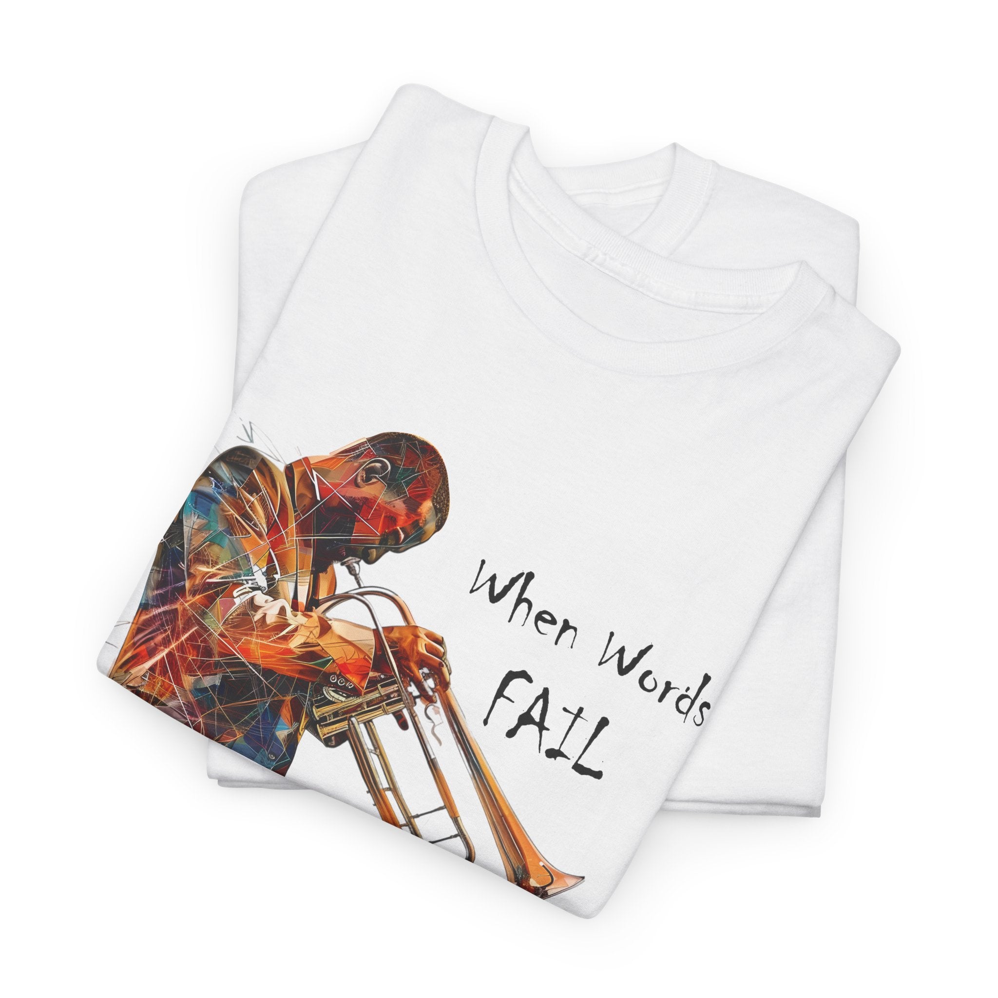 A white t shirt with a trumpet player image. The words that come with the image say ‘When Words fail JAZZ Speaks’