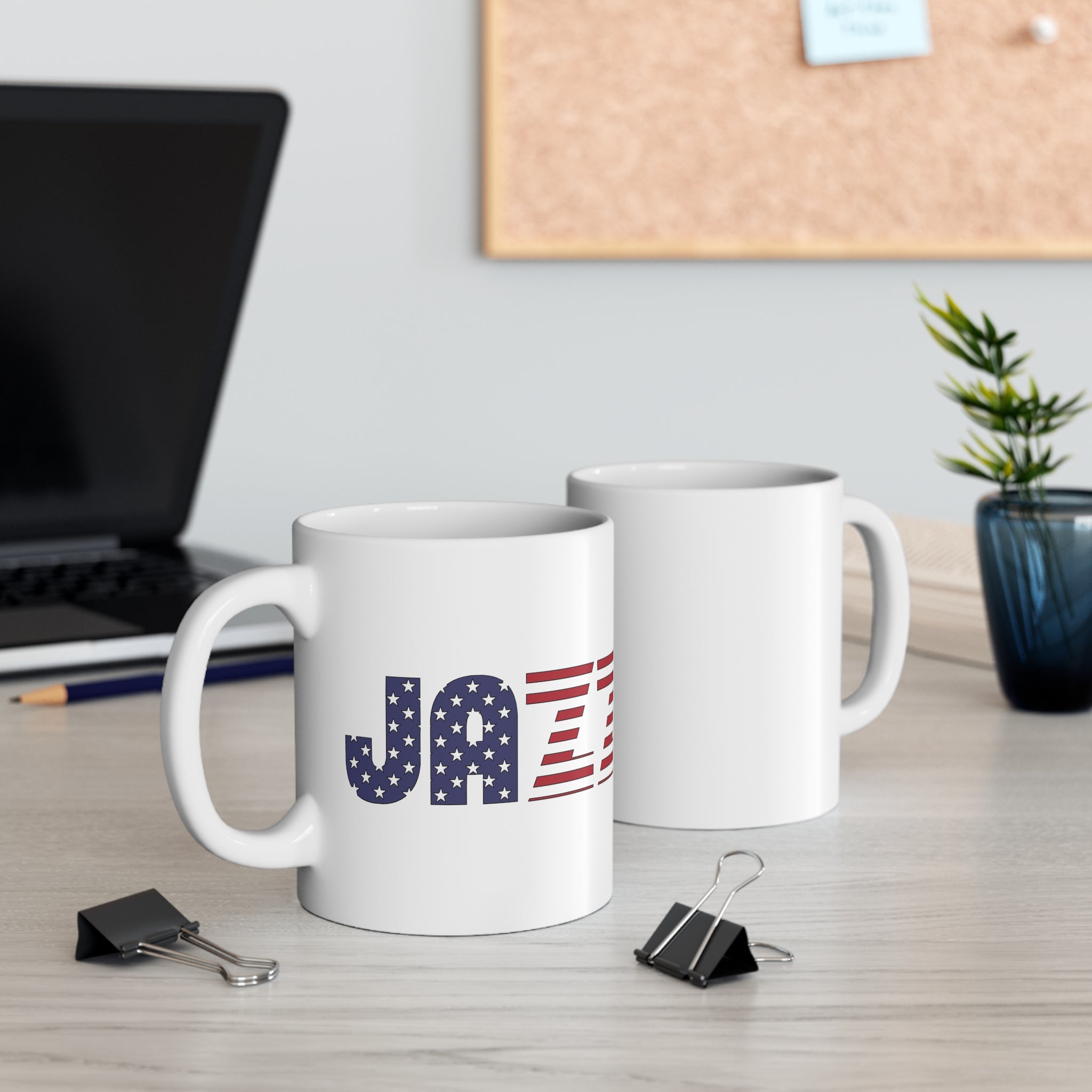 A white coffee mug with an American flag embossed into the word ‘JAZZ’ as the design image