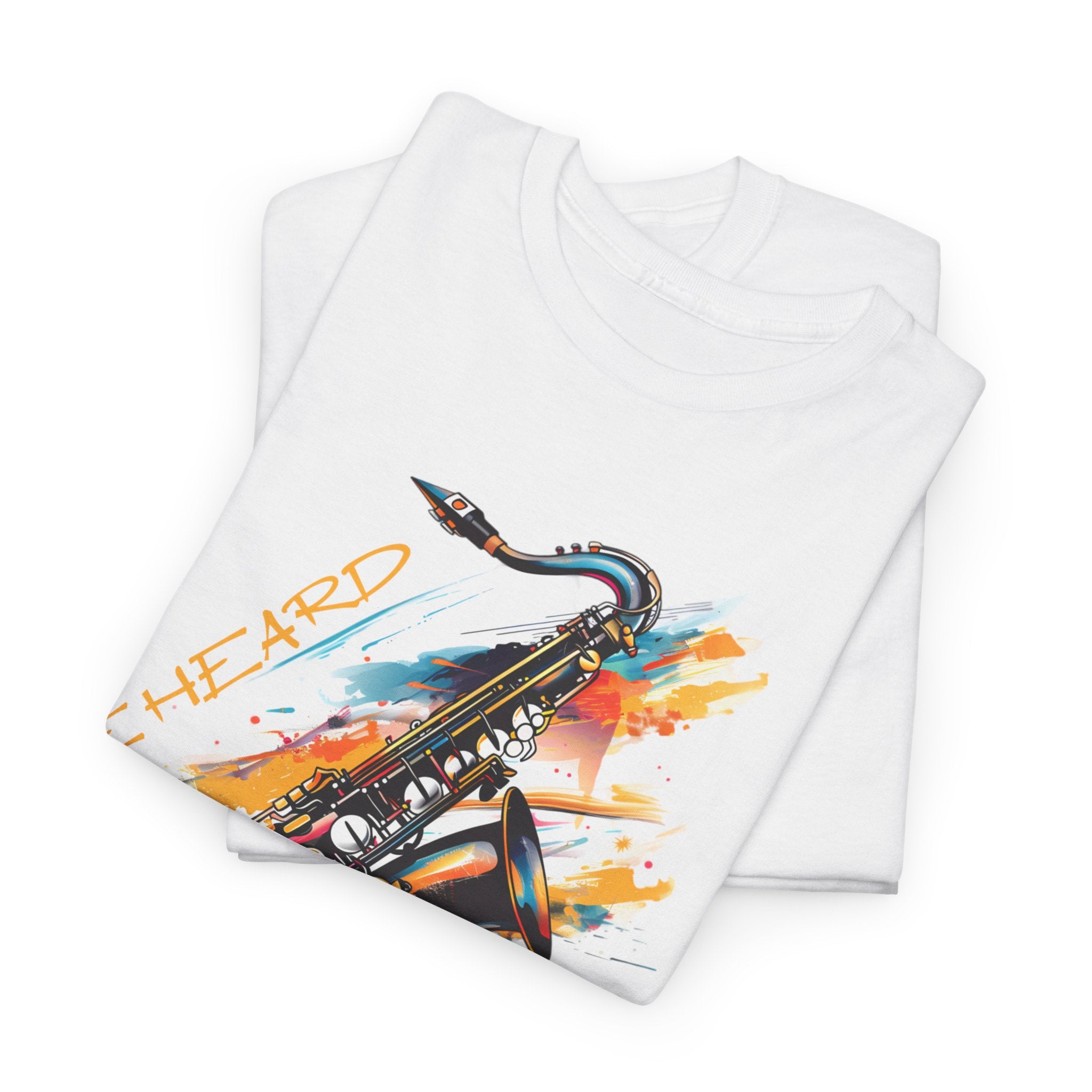 A white t shirt with a saxophone image. The words ‘Jazz, Be heard’ surround the image.