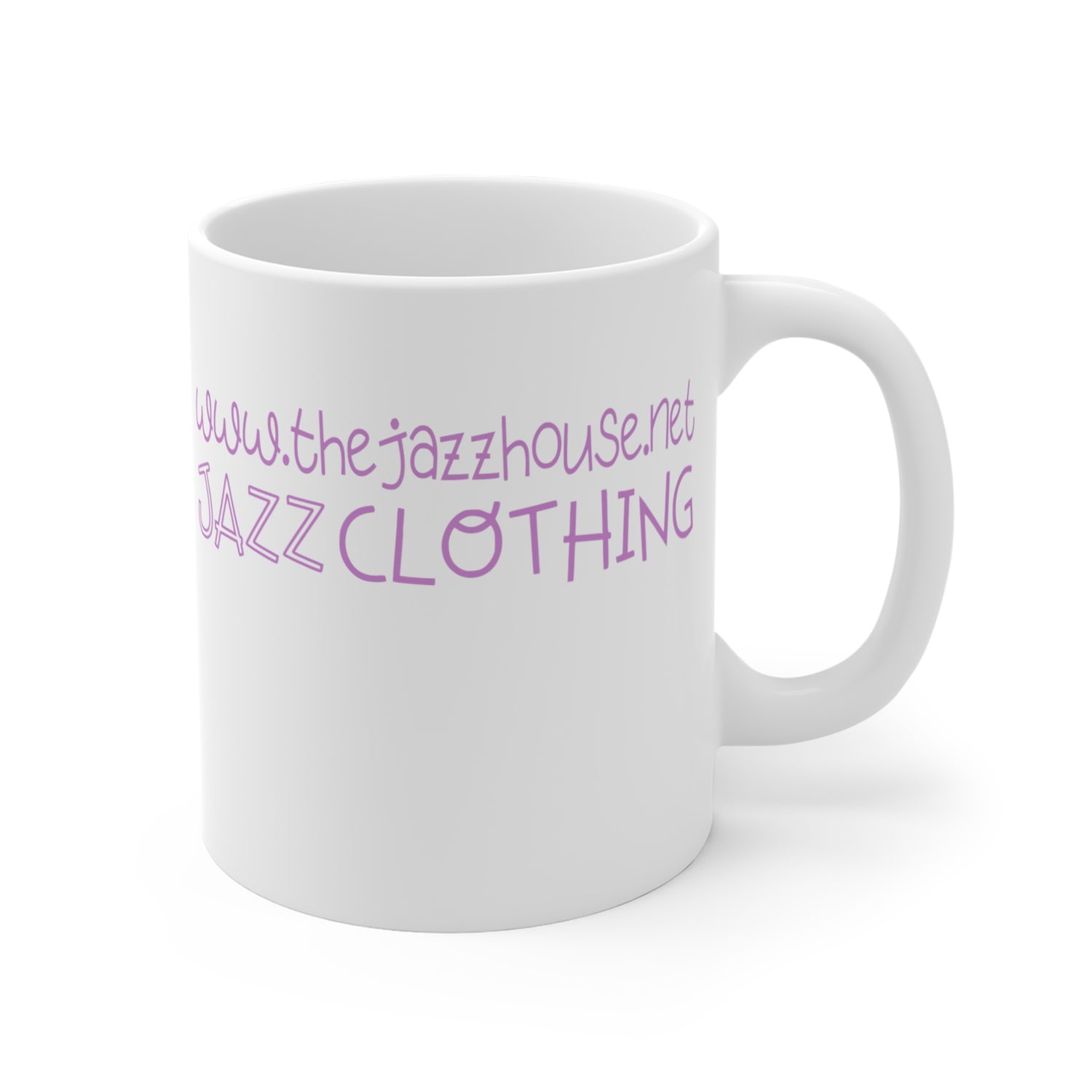 A coffee mug featuring ‘The Jazz House’ logo image of a trumpeter leaning against the wall of The Jazz House club playing, whilst purple smoke rises from his instrument. The scene is set in a dimly lit alley. The rear of the mug has the website URL with the words ‘Jazz Clothing.’