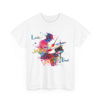 A black or white t shirt with an image of a jazz drummer in vibrant colors. The accompanying text states ‘Lovin a Jazz Beat’