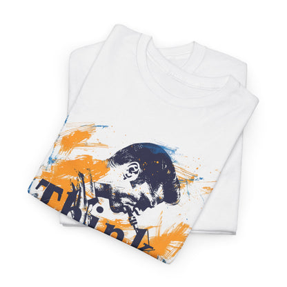 White t shirt with a blue and gold abstract design of a sax player with the words ‘Think jazz’ integrated into the design.