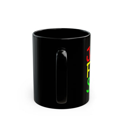 A black coffee mug with unusual funky font saying JAZZ, FUNK, SOUL, in red, yellow &amp; green.