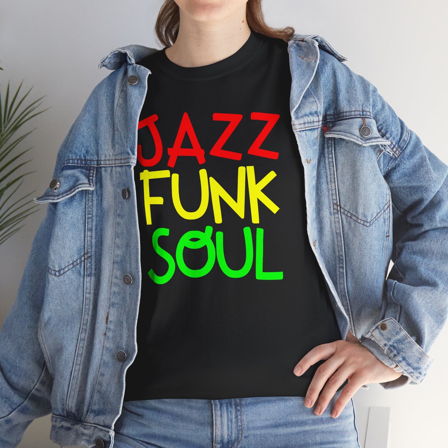 Person wearing a black t-shirt with &