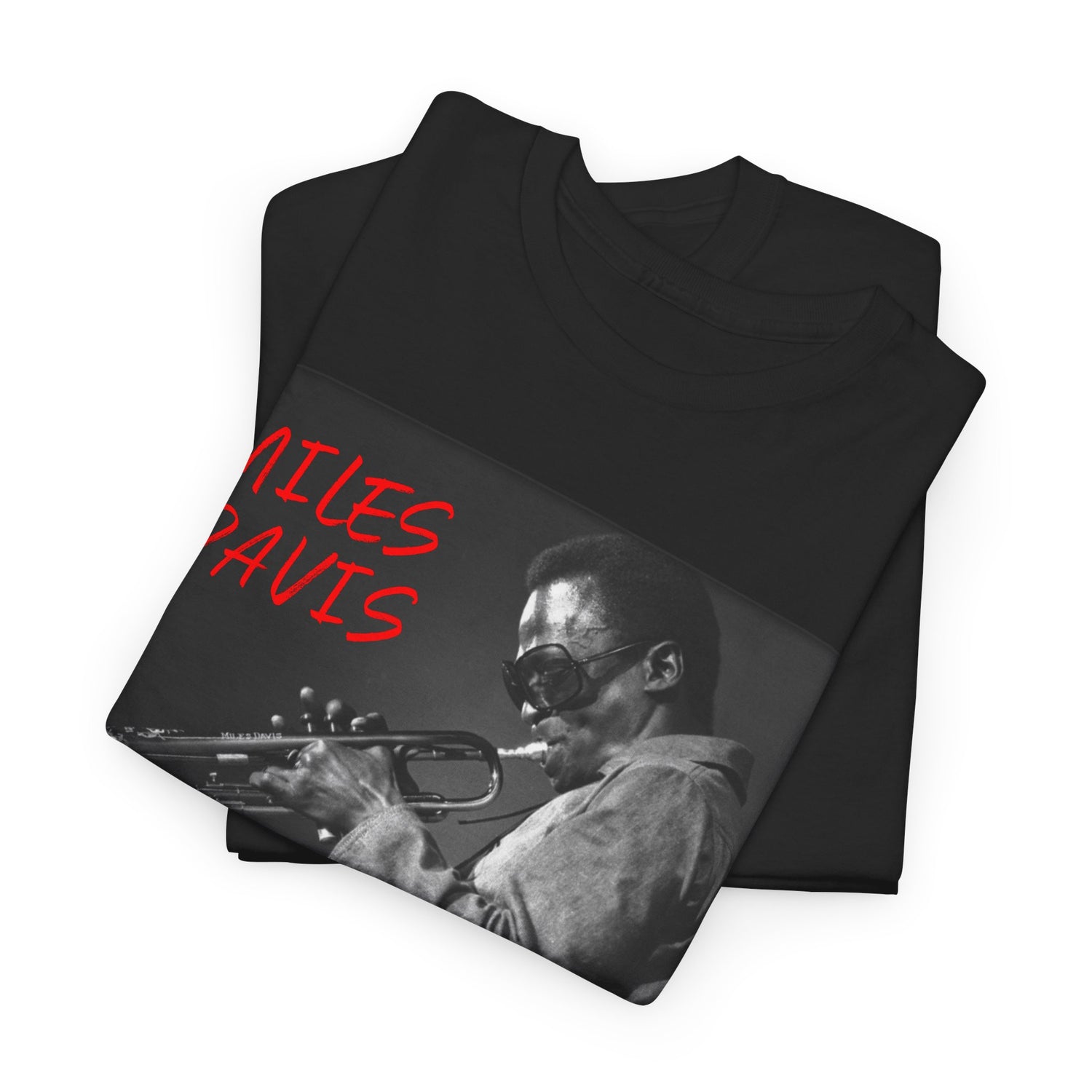 A black &amp; white photographic image of Miles Davis playing trumpet in cool shades, with red text saying ‘Miles Davis’