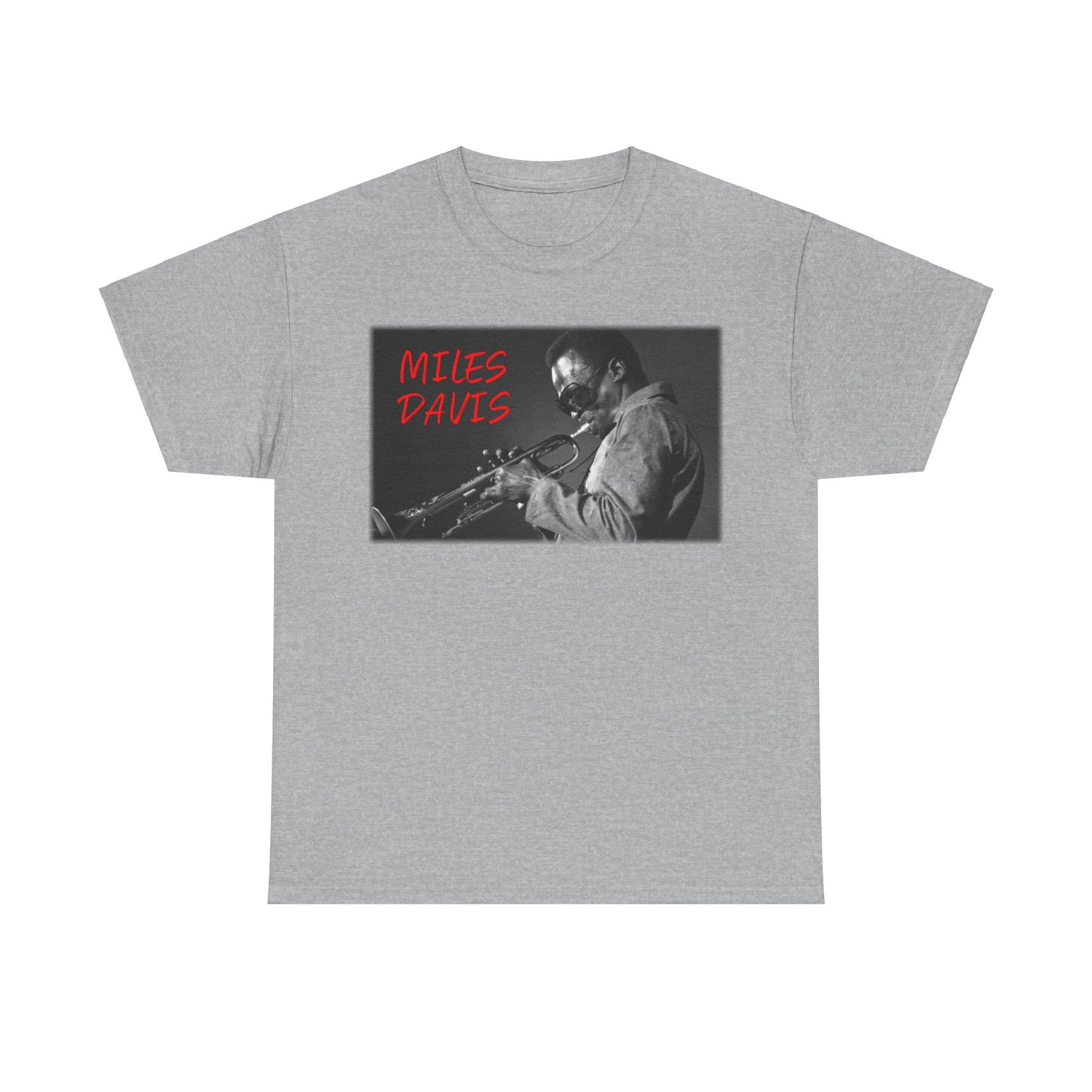 A black &amp; white photographic image of Miles Davis playing trumpet in cool shades, with red text saying ‘Miles Davis’
