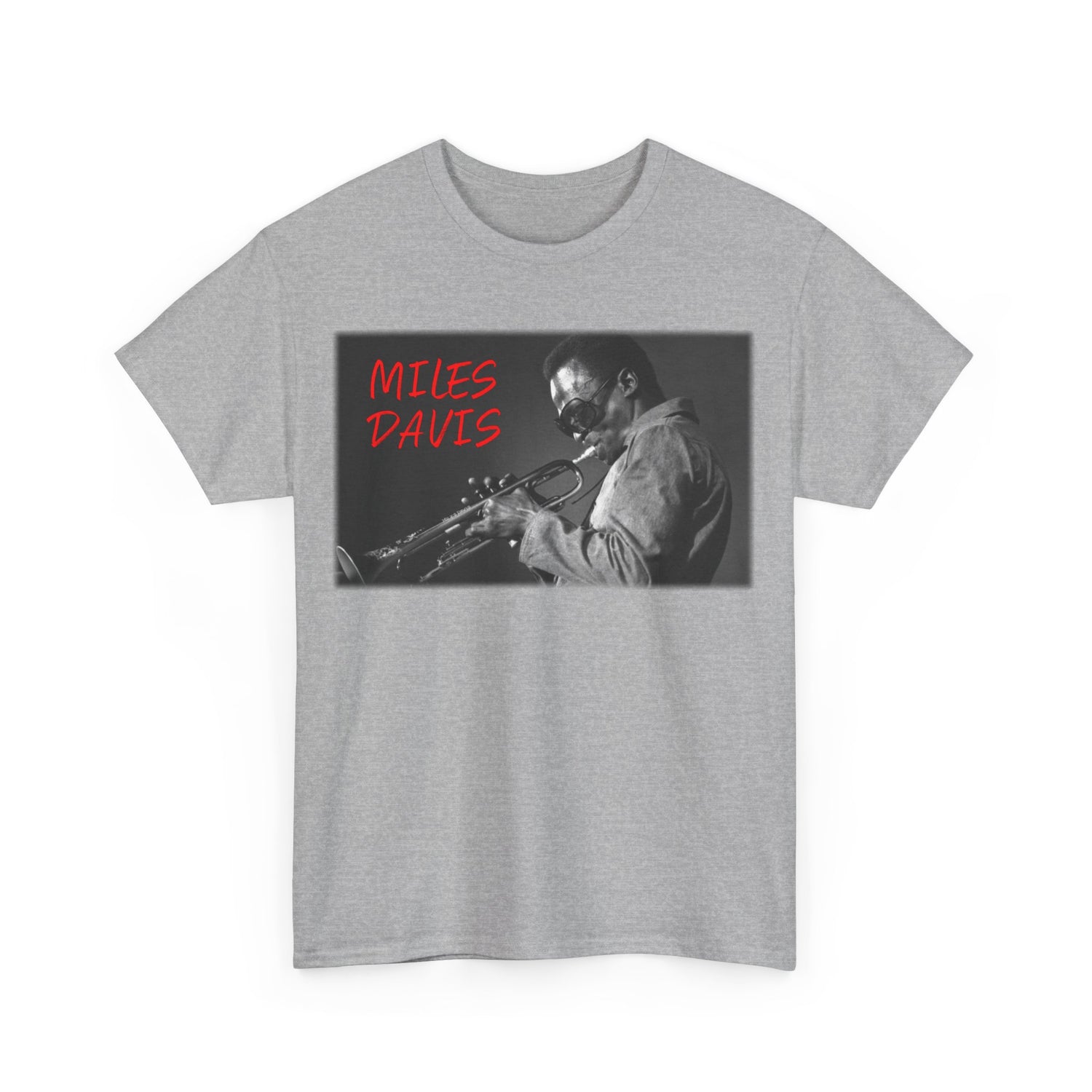 A black &amp; white photographic image of Miles Davis playing trumpet in cool shades, with red text saying ‘Miles Davis’