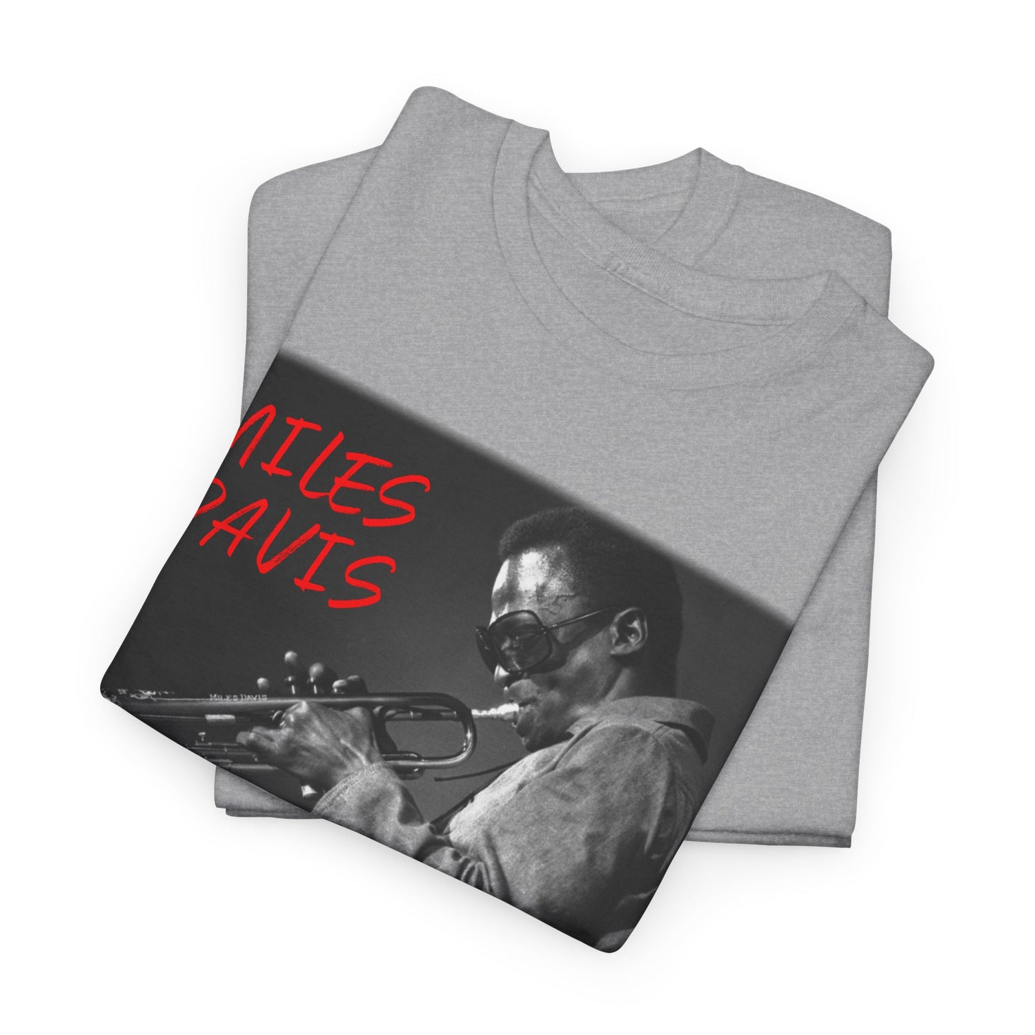 A black &amp; white photographic image of Miles Davis playing trumpet in cool shades, with red text saying ‘Miles Davis’