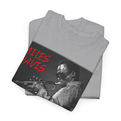 A black &amp; white photographic image of Miles Davis playing trumpet in cool shades, with red text saying ‘Miles Davis’