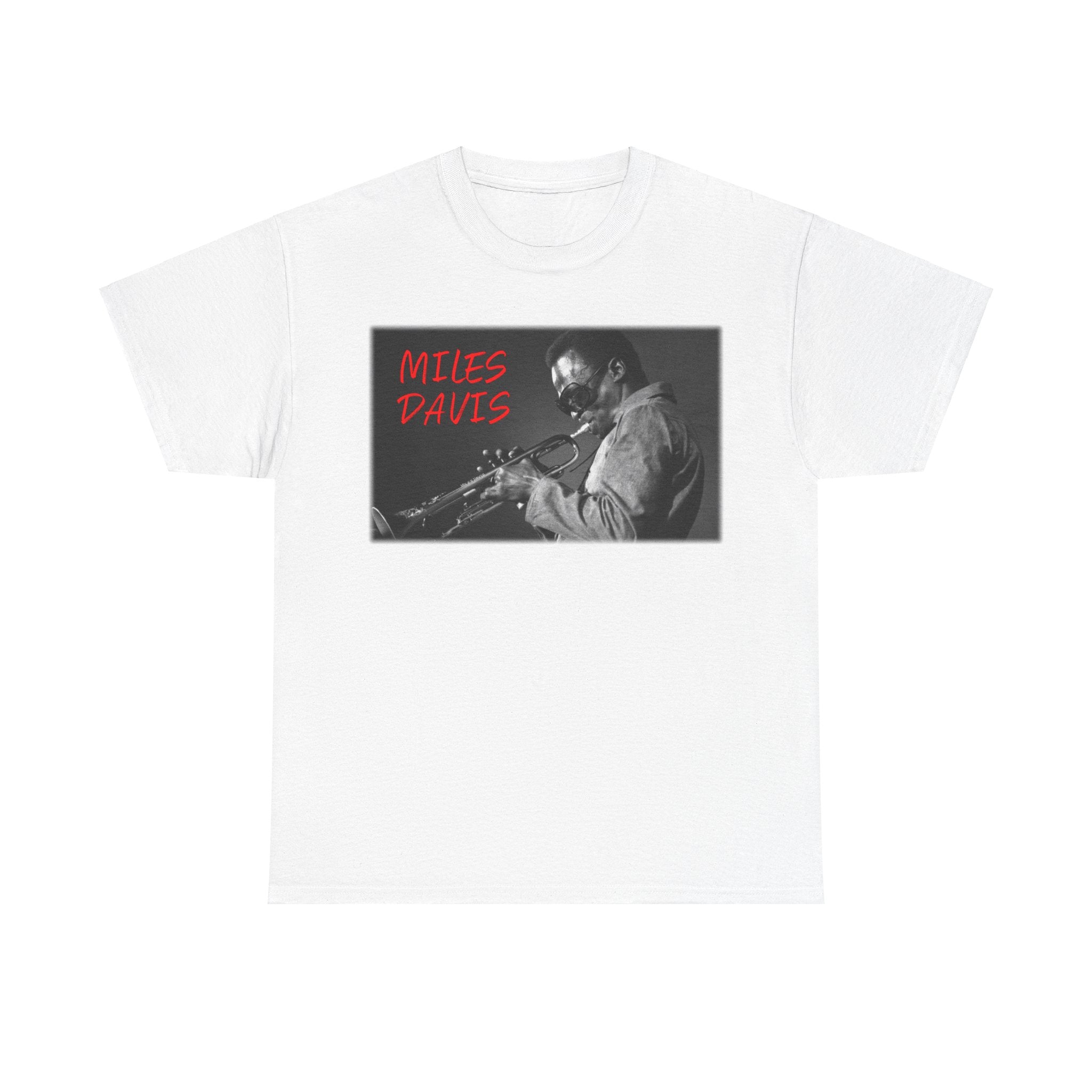 A black &amp; white photographic image of Miles Davis playing trumpet in cool shades, with red text saying ‘Miles Davis’